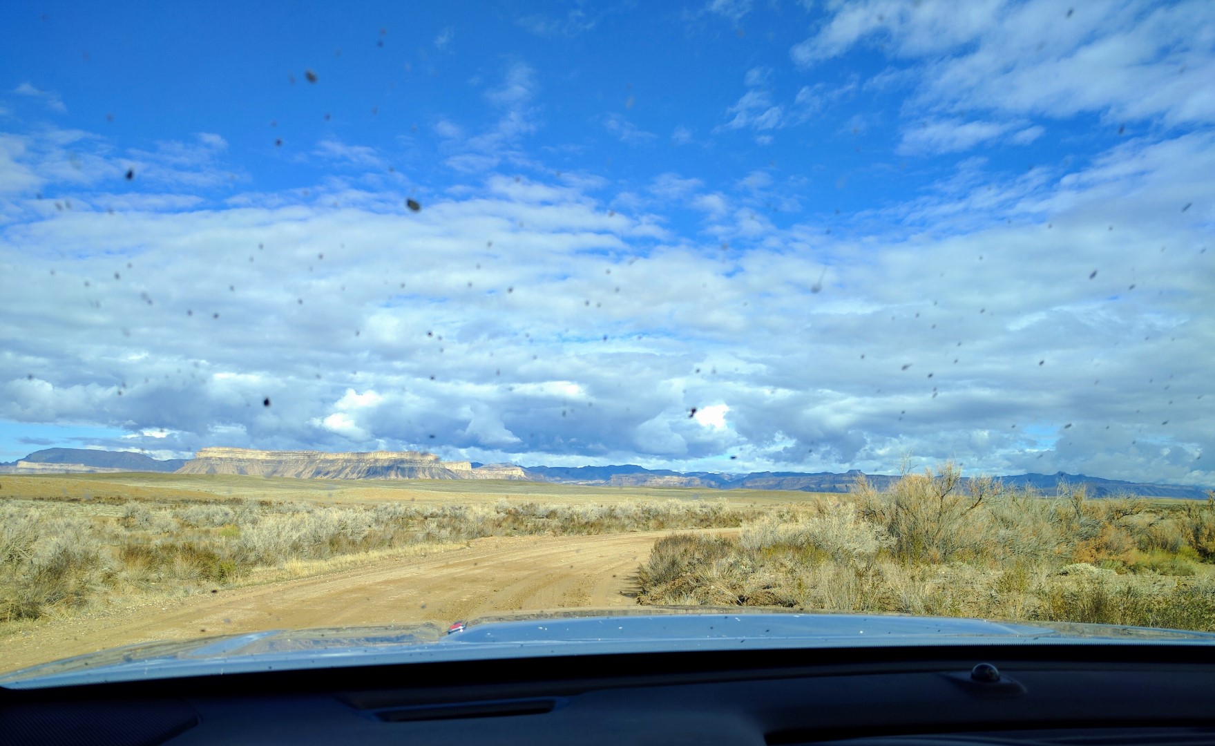 I-70 comes into view through the mud-spattered windshield